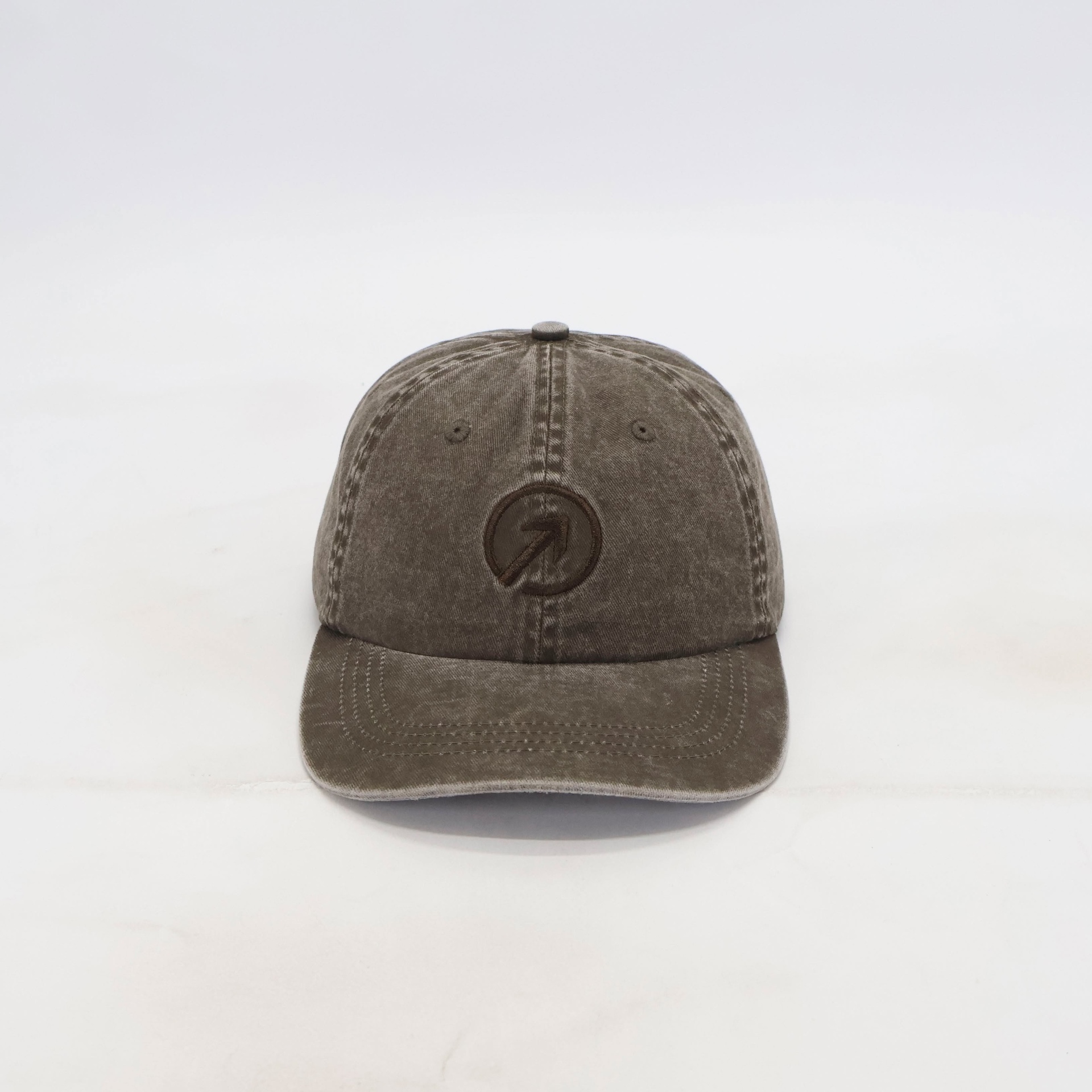 OneFaze Heritage Washed Cap in washed brown, front view with tonal arrow embroidery